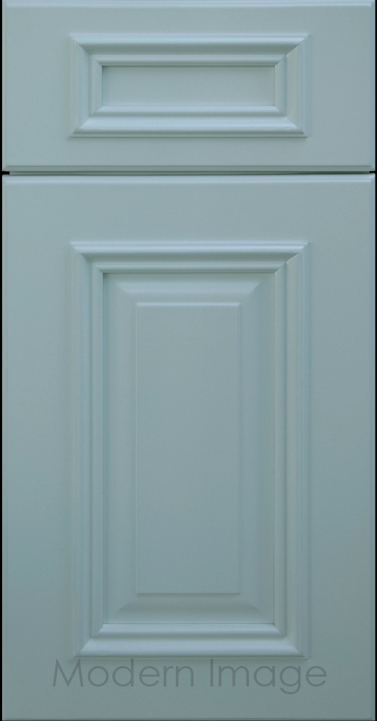 Hamilton cabinet door in Niebla Azul color with double raised panel and mitered elevated molding.
